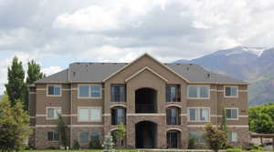 View of building exterior with a mountain view
