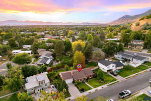 Aerial view at dusk of a residential view and a mountain view