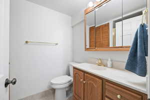 Bathroom featuring vanity and light tile patterned floors