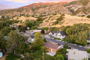 Aerial view at dusk of a mountain view and a residential view