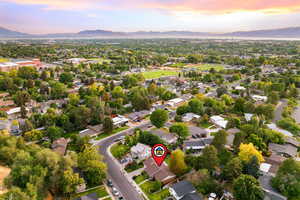 Aerial view at dusk of a mountain view and a residential view