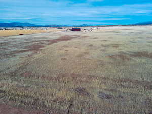 Overview of rural landscape featuring mountains