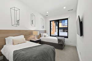 Bedroom featuring carpet flooring and recessed lighting