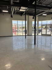 Garage featuring baseboards