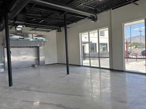 Below grade area with plenty of natural light and a garage