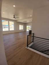 Unfurnished room featuring wood finished floors, recessed lighting, and a ceiling fan