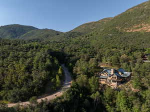 Rear view of the home with Ida Road to the left leading to Children's Road