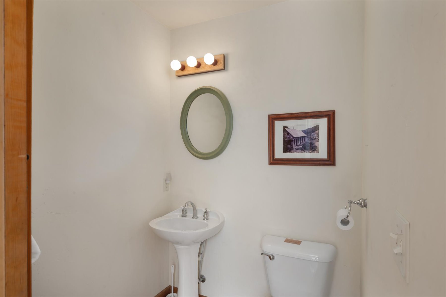 Powder bathroom with Saltillo floor tiles