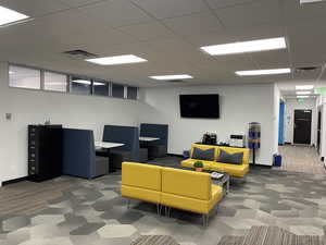 Community lobby featuring a drop ceiling
