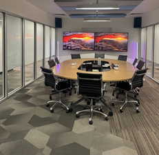 Office area featuring dark colored carpet