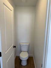 Bathroom featuring dark wood-style flooring