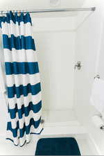 Bathroom with a tile shower