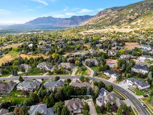 Aerial view of residential area with a mountainous background