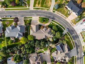 Aerial view of property's location featuring nearby suburban area