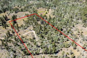 Aerial overview of property's location featuring property boundaries highlighted