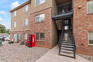 View of building exterior featuring stairs