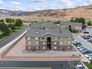 View of subject property featuring a mountain backdrop