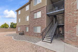 View of property featuring stairway