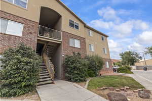 View of building exterior featuring stairs