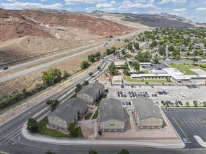 Aerial view of residential area featuring a mountain backdrop