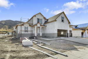 Property under construction with a mountain view