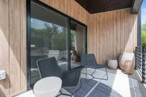 View of spacious and sunny outdoor balcony