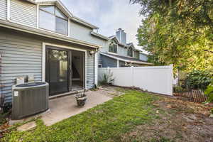 Rear view of house featuring a patio area