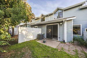 Rear view of house with a patio