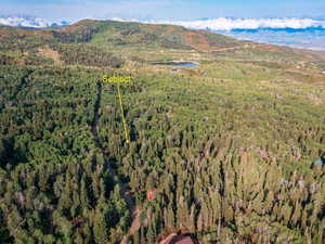 View of property location with a mountainous background and property parcel outlined