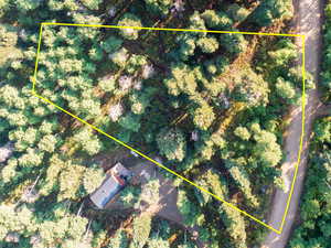 Aerial overview of property's location featuring property parcel outlined