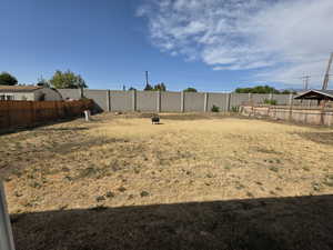 View of fenced backyard