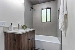 Full bathroom with vanity and shower / bath combination