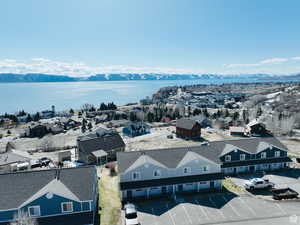 Aerial view of residential area featuring a water and mountain view