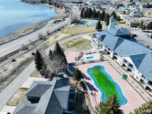 Aerial view of a nearby body of water and a pool
