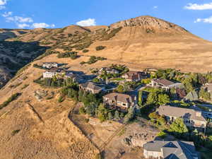 View of mountain backdrop with nearby suburban area