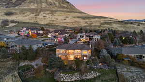 Aerial view at dusk of a mountain view and a residential view