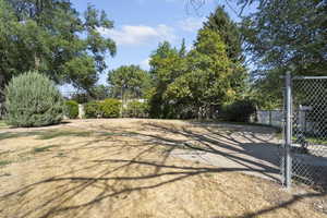 common area with grass and sand area