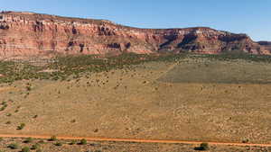View of mountain background featuring rural landscape