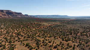 View of mountain backdrop featuring a desert landscape and rural landscape