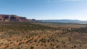 View of mountain backdrop with a desert landscape and rural landscape
