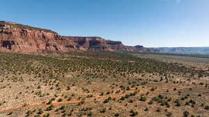 View of mountain backdrop featuring rural landscape