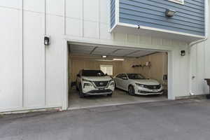 Garage featuring driveway