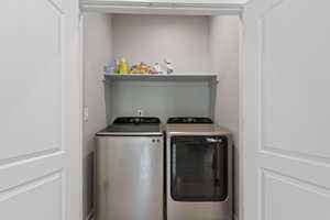 Laundry room featuring washing machine and dryer