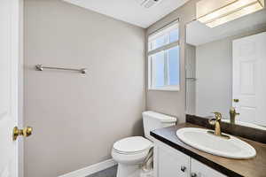 Bathroom with vanity and tile patterned floors