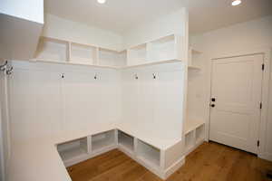 Mudroom featuring LVP floors and recessed lighting