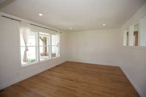 Living room featuring recessed lighting and LVP floors
