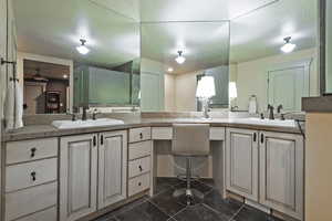 Full bathroom featuring a textured ceiling