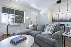 Living area with wood finished floors