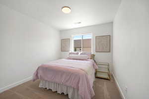 Bedroom with carpet flooring