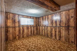 Bedroom #3 with day light above ground window.